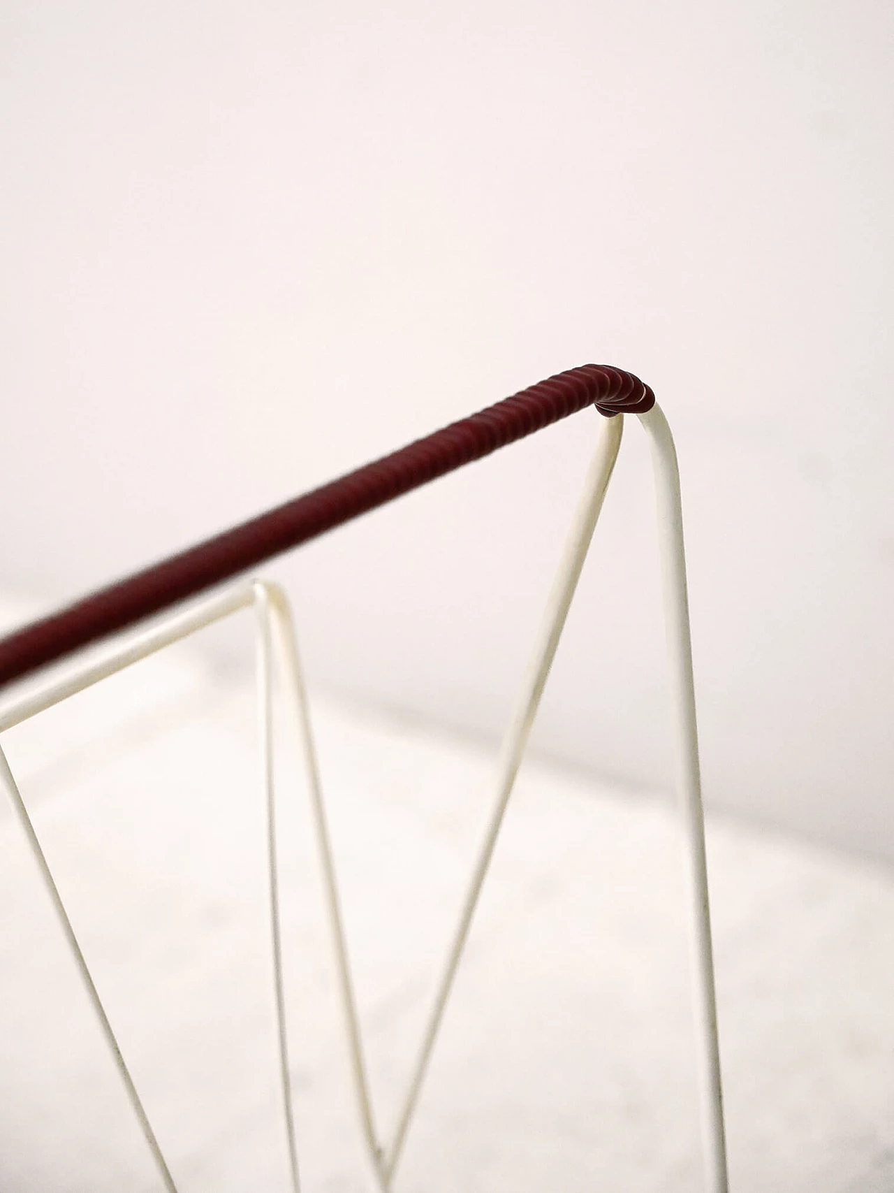 Scandinavian white metal and woven plastic magazine rack, 1960s 6