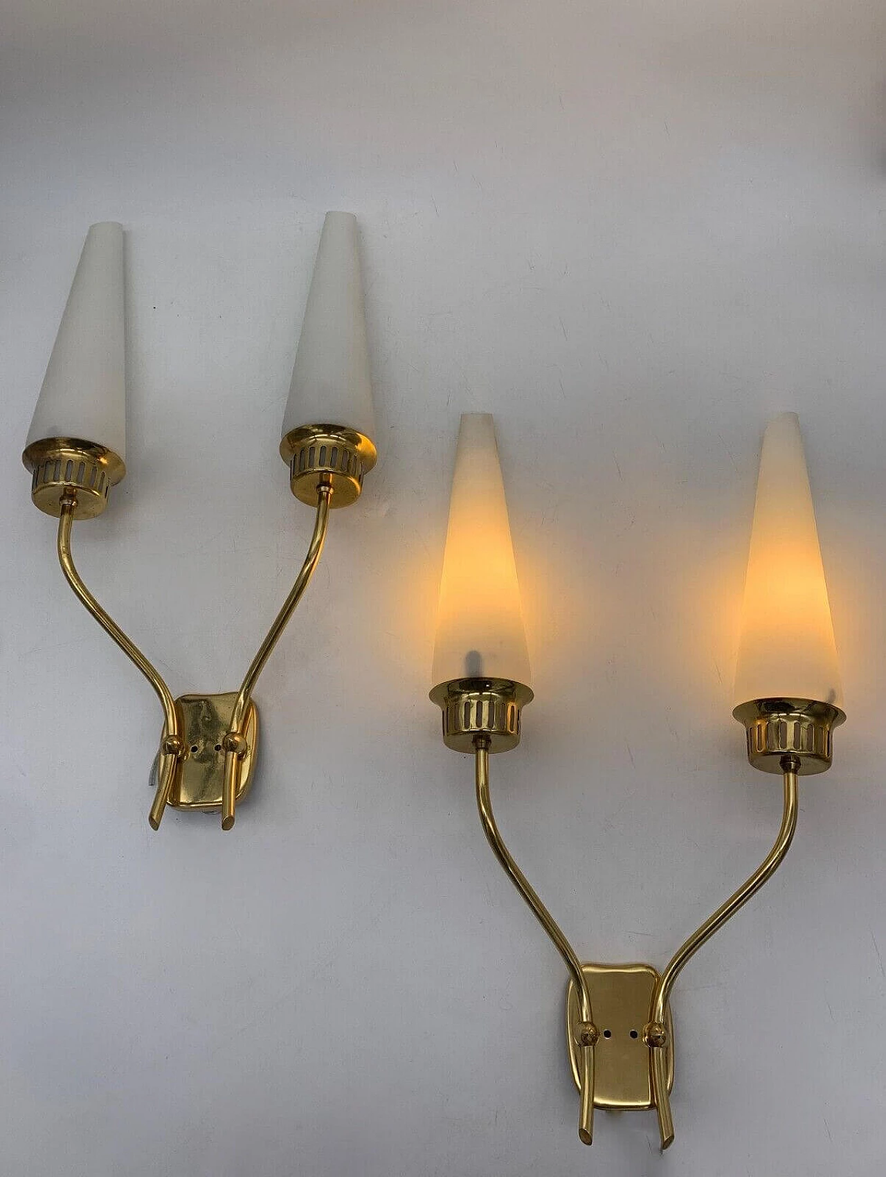 Pair of two-light iron and brass wall sconces attributed to Stilnovo, 1960s 2