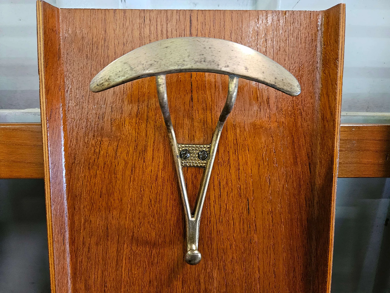 Wall-mounted coat rack in wood, brass and skai, 1950s 4