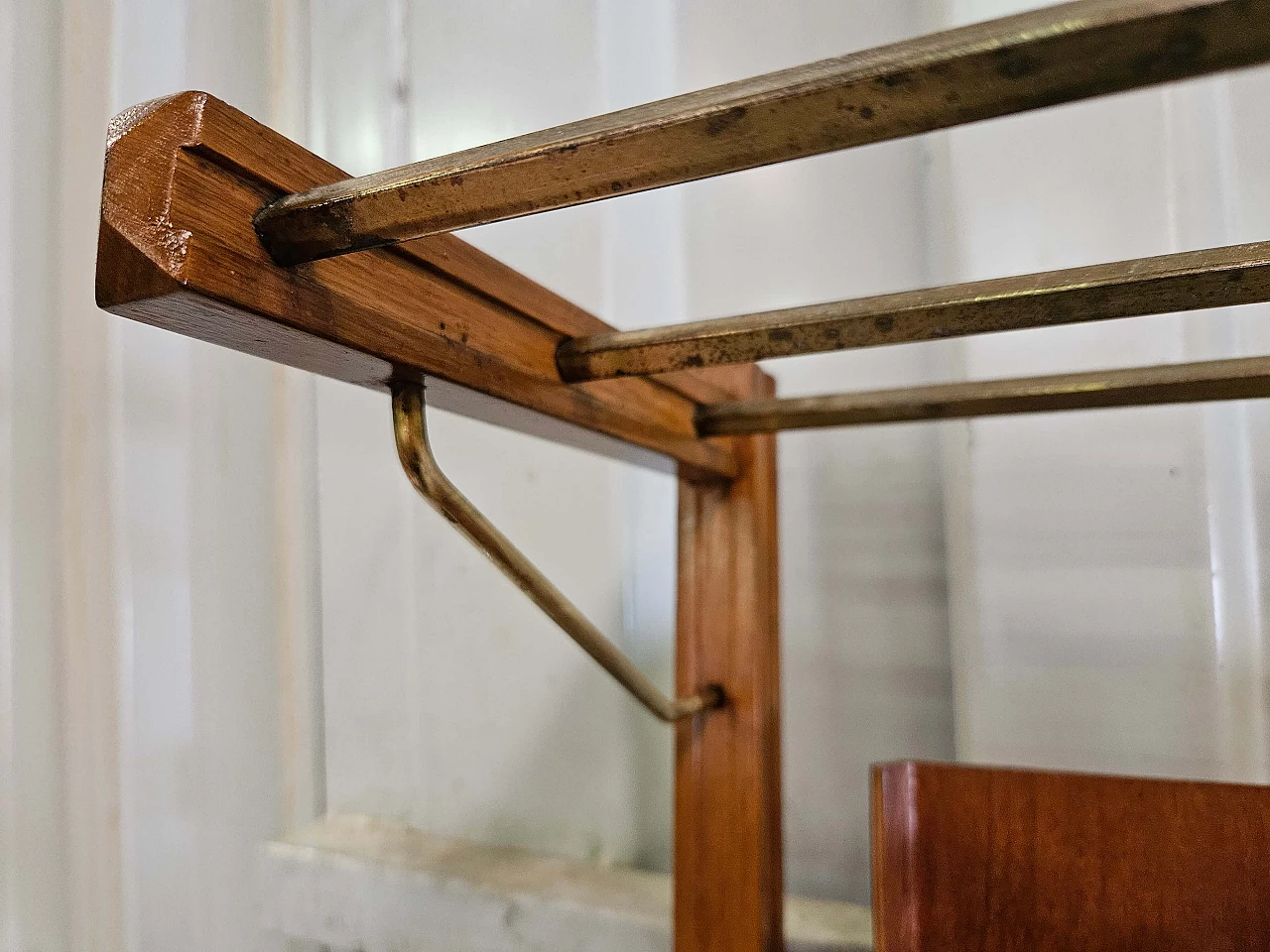 Wall-mounted coat rack in wood, brass and skai, 1950s 11