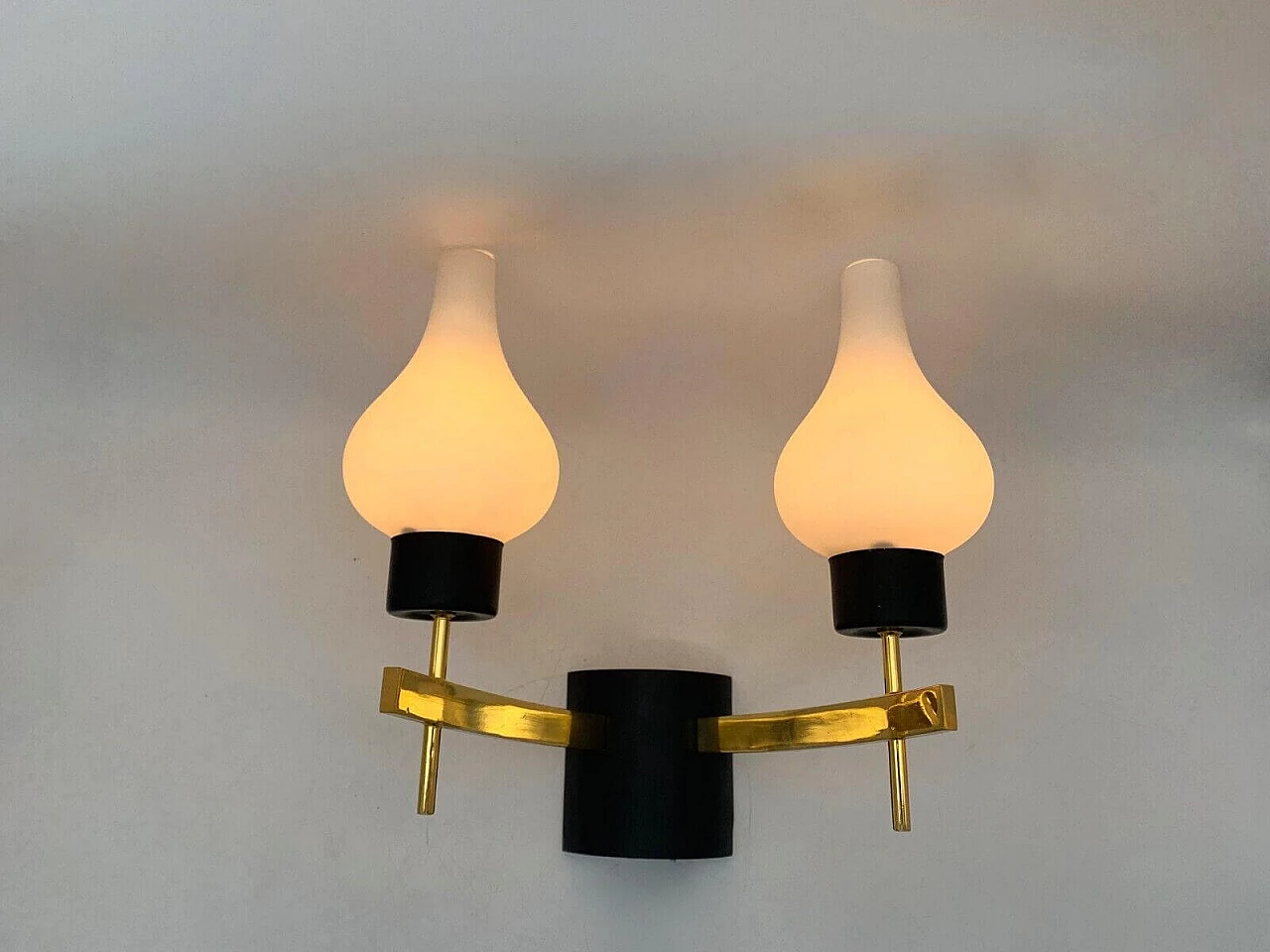 Pair of white, black and gold wall sconces attributed to Stilnovo, late 20th century 1