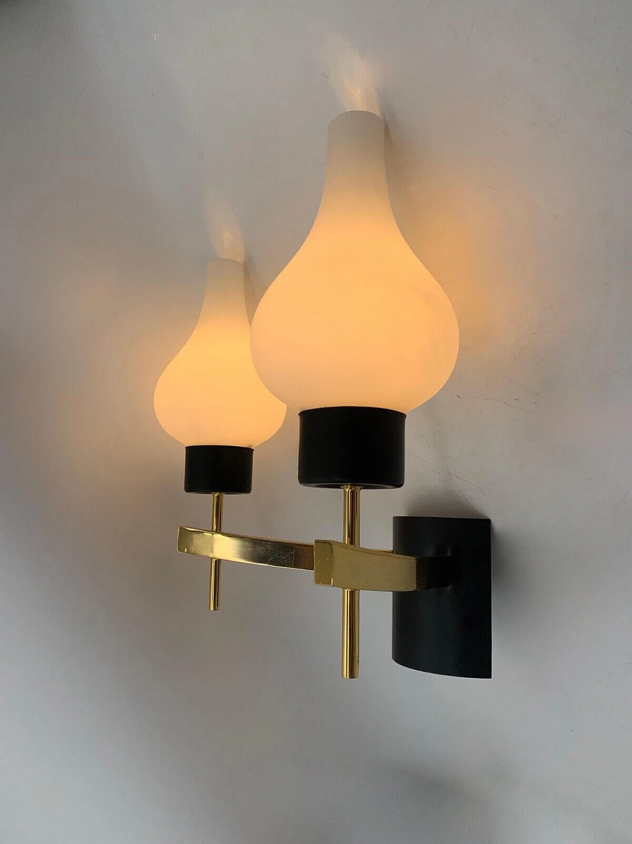 Pair of white, black and gold wall sconces attributed to Stilnovo, late 20th century 2