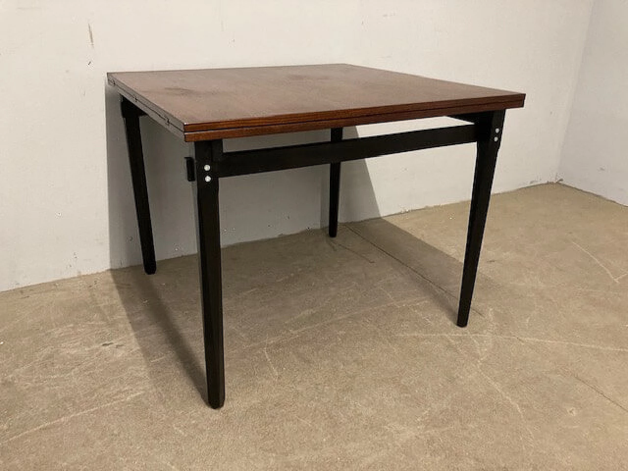 Rosewood extending table with black lacquered legs, 1960s 2