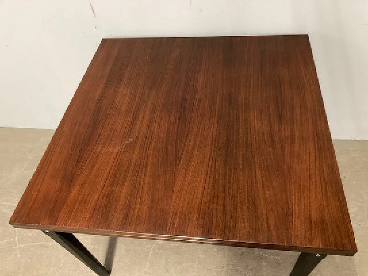 Rosewood extending table with black lacquered legs, 1960s 4