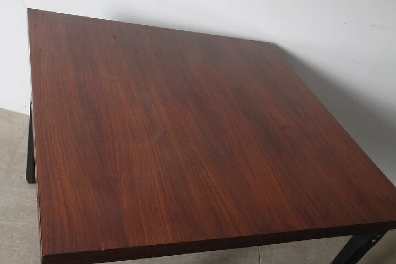 Rosewood extending table with black lacquered legs, 1960s 10