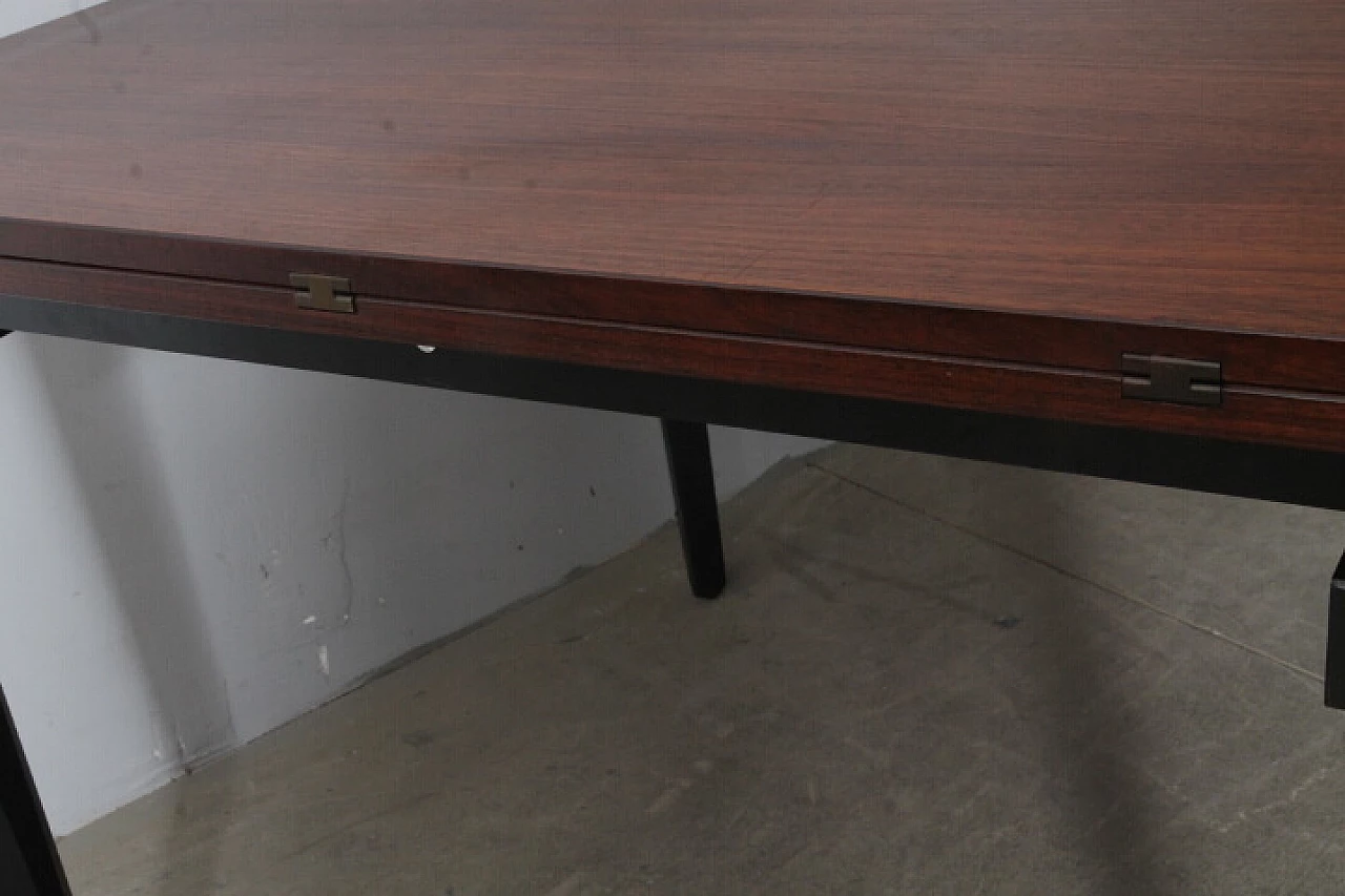 Rosewood extending table with black lacquered legs, 1960s 12