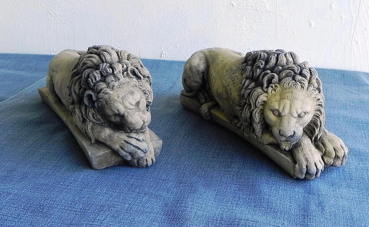 Pair of stone sculptures of sleeping lions 2