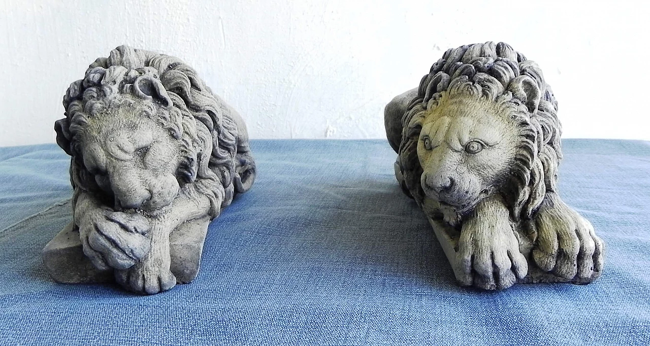 Pair of stone sculptures of sleeping lions 5