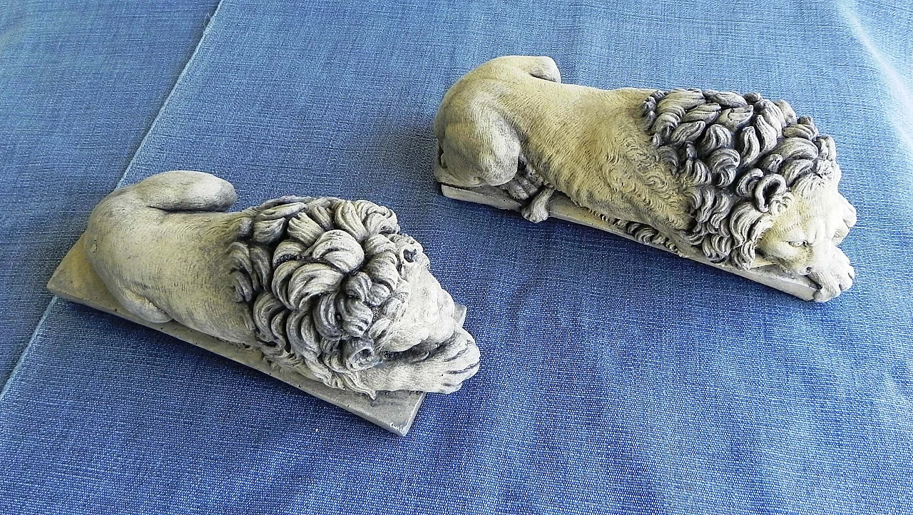 Pair of stone sculptures of sleeping lions 8