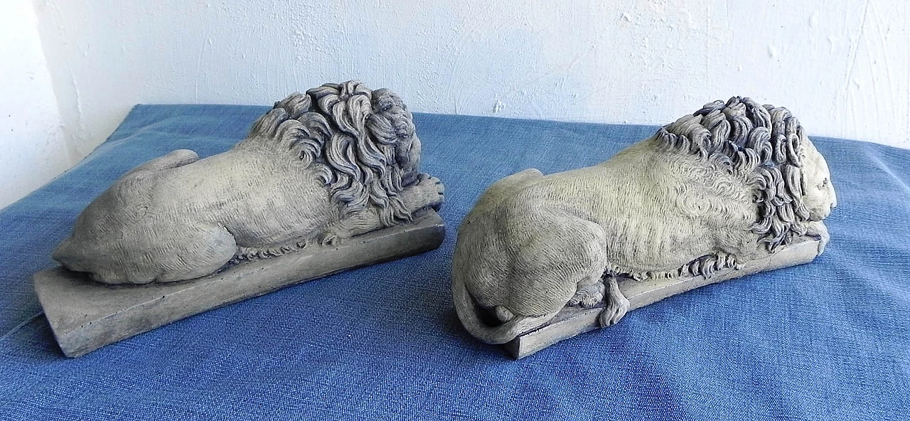 Pair of stone sculptures of sleeping lions 9
