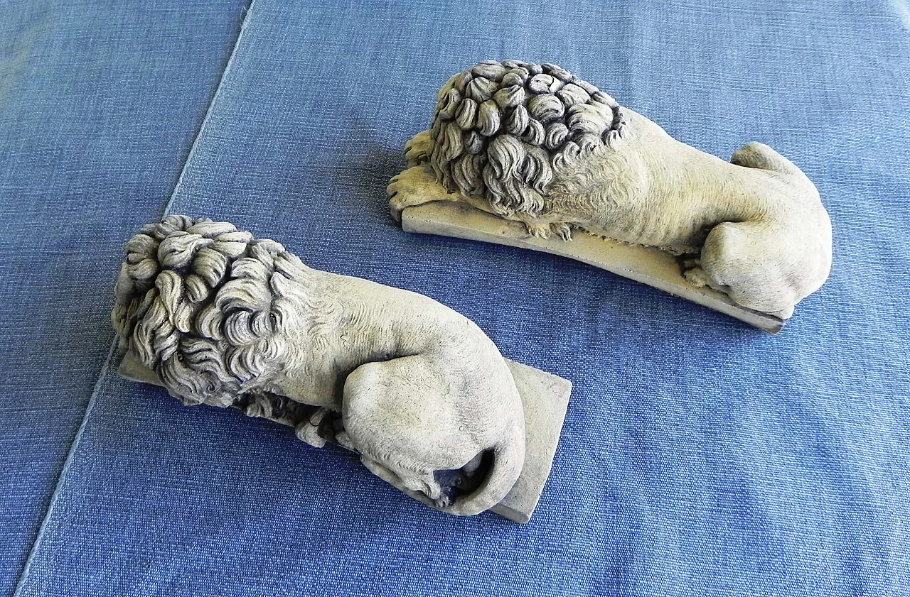 Pair of stone sculptures of sleeping lions 12