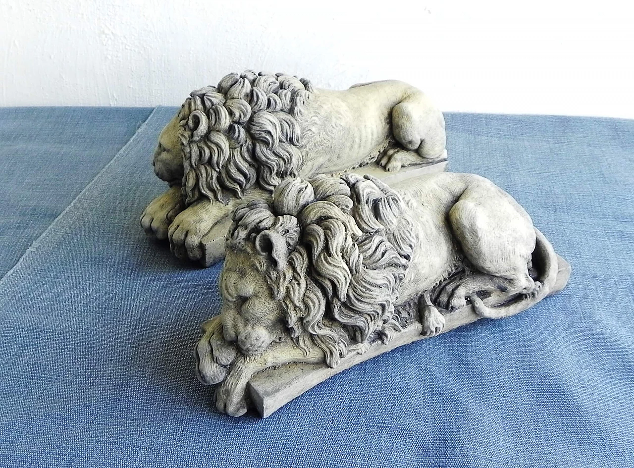 Pair of stone sculptures of sleeping lions 13