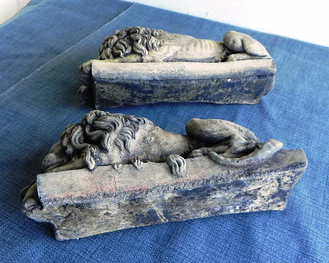 Pair of stone sculptures of sleeping lions 16