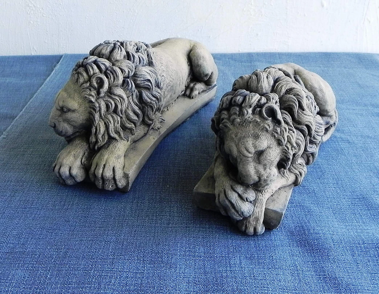 Pair of stone sculptures of sleeping lions 17