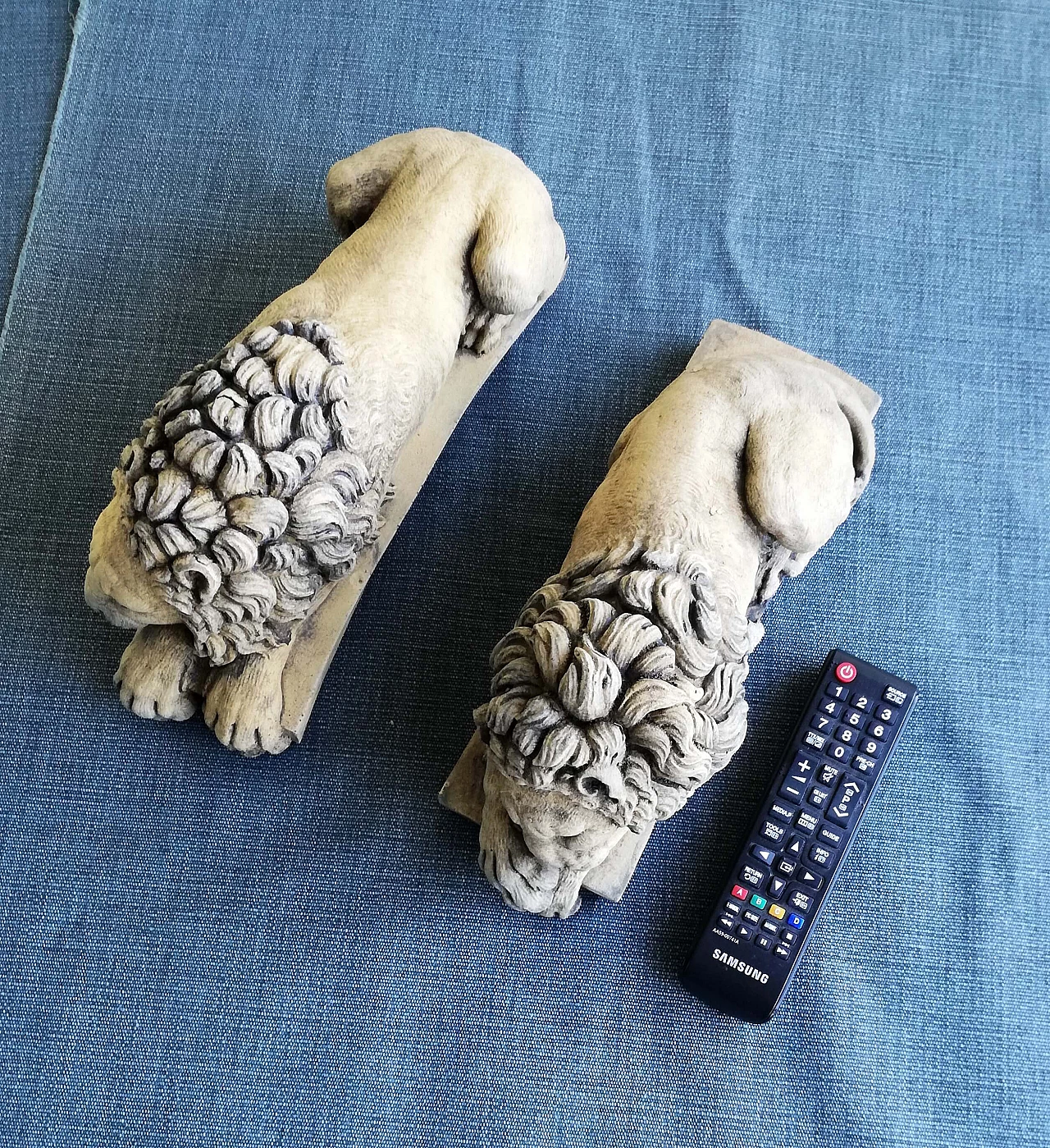 Pair of stone sculptures of sleeping lions 22