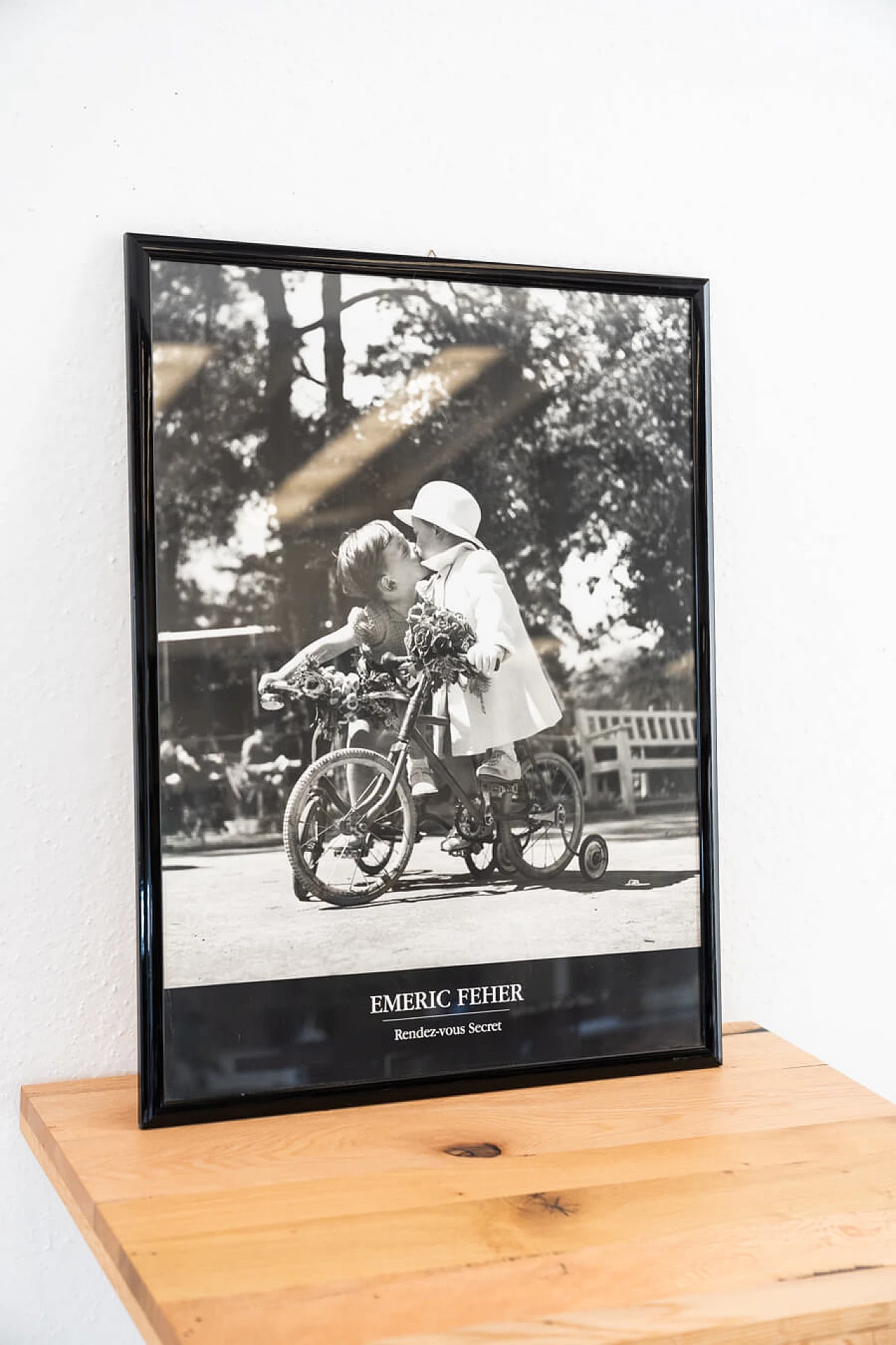 Black and white print of children on tricycle, 2000 2