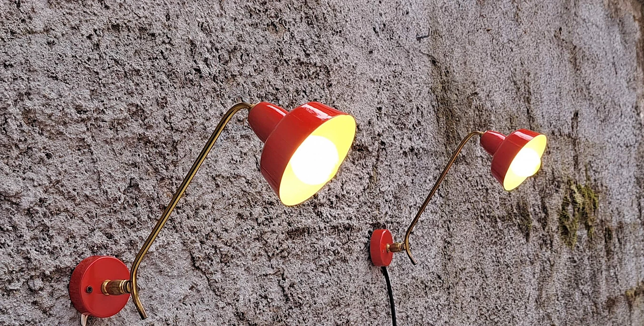 Pair of red enameled metal and brass wall lights, 1970s 1