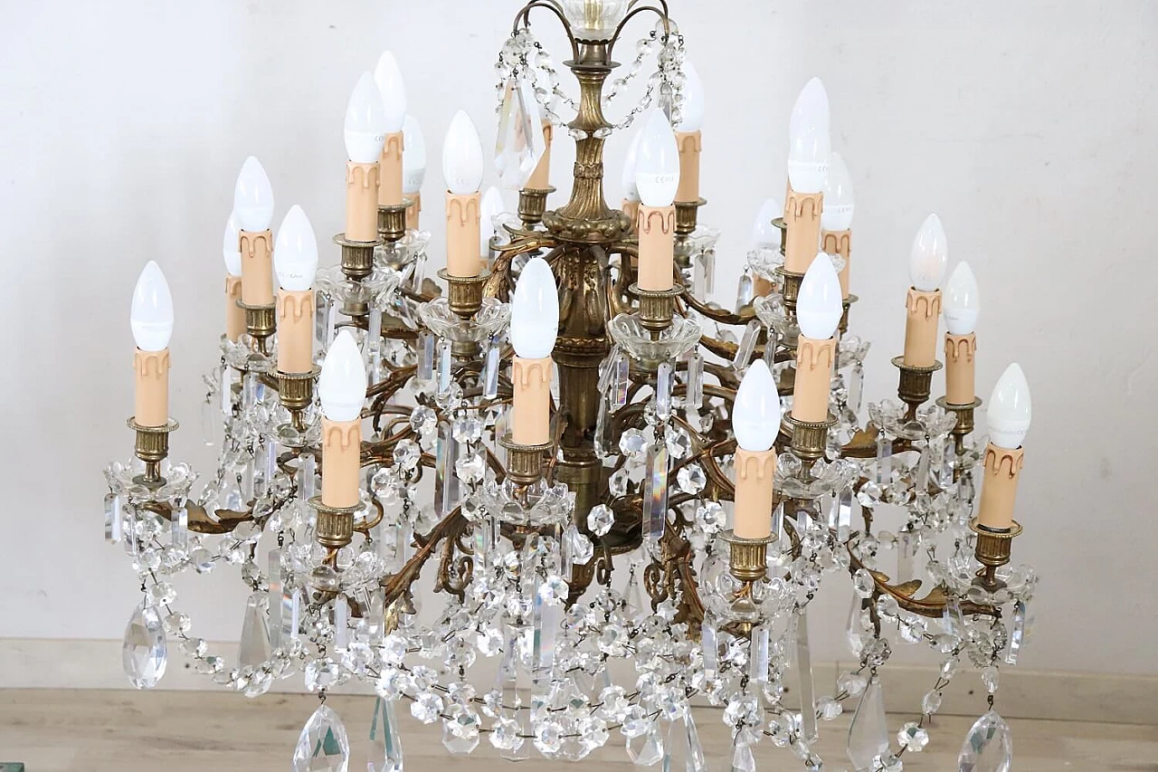 Twenty-four-light bronze chandelier with crystals, 1920s 4