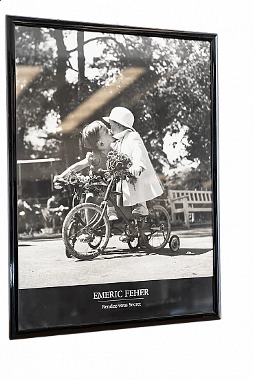 Black and white print of children on tricycle, 2000