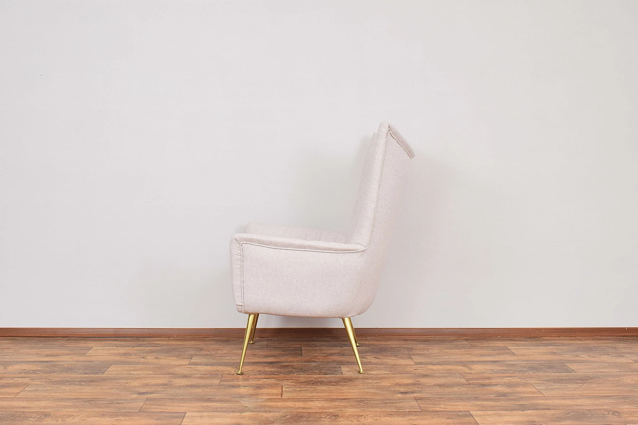 Wool armchair with gilded metal legs, 1960s 4