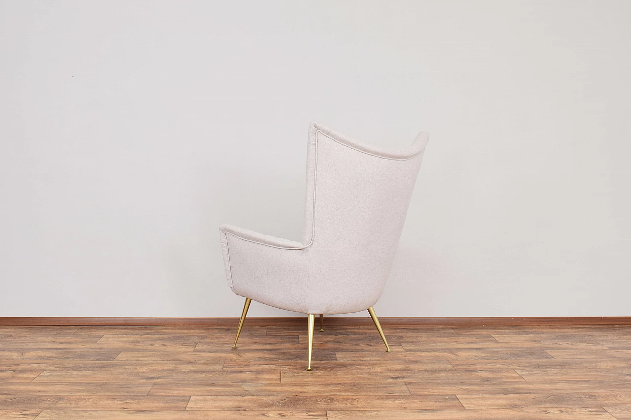 Wool armchair with gilded metal legs, 1960s 6