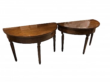 Pair of walnut half-moon consoles, mid-19th century