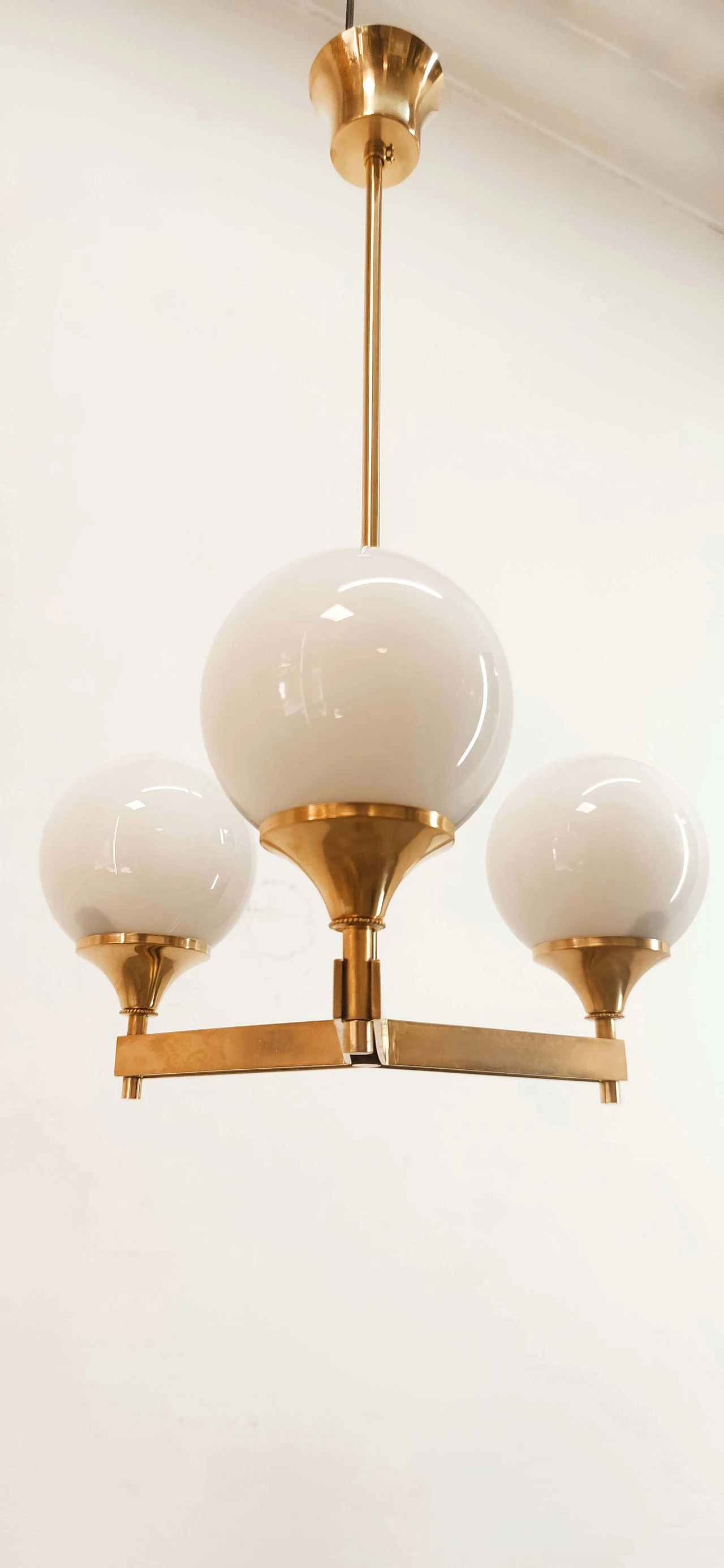 Three-light brass and shiny white glass chandelier, 1970s 3