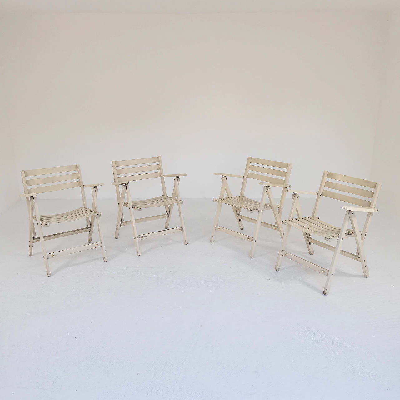 4 Folding wooden chairs made by Fratelli Reguitti, 1960s 4