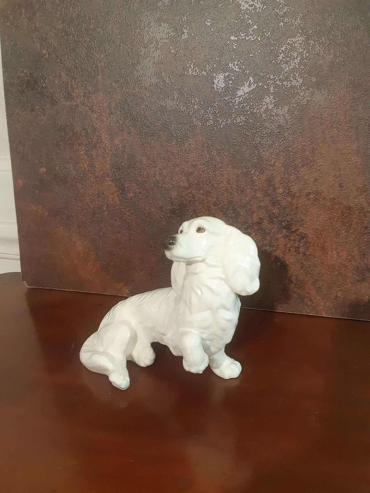 Porcelain long-haired dachshund sculpture by Goebel 1