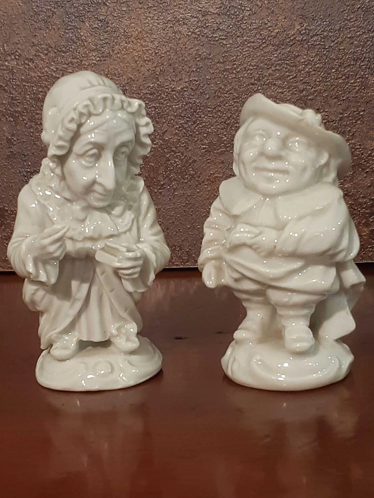 Pair of Capodimonte porcelain Caramogi sculptures, early 20th century 1