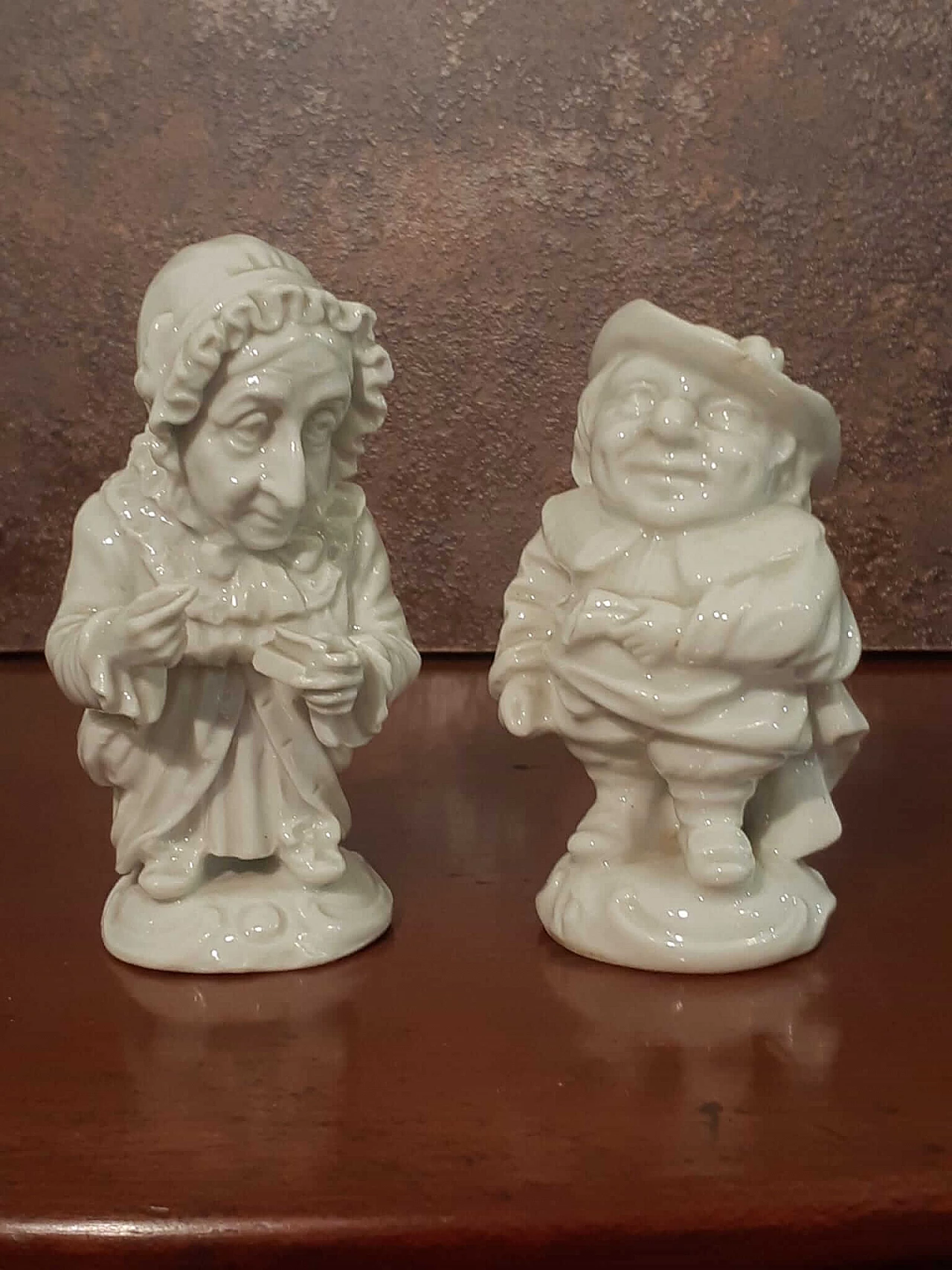 Pair of Capodimonte porcelain Caramogi sculptures, early 20th century 2