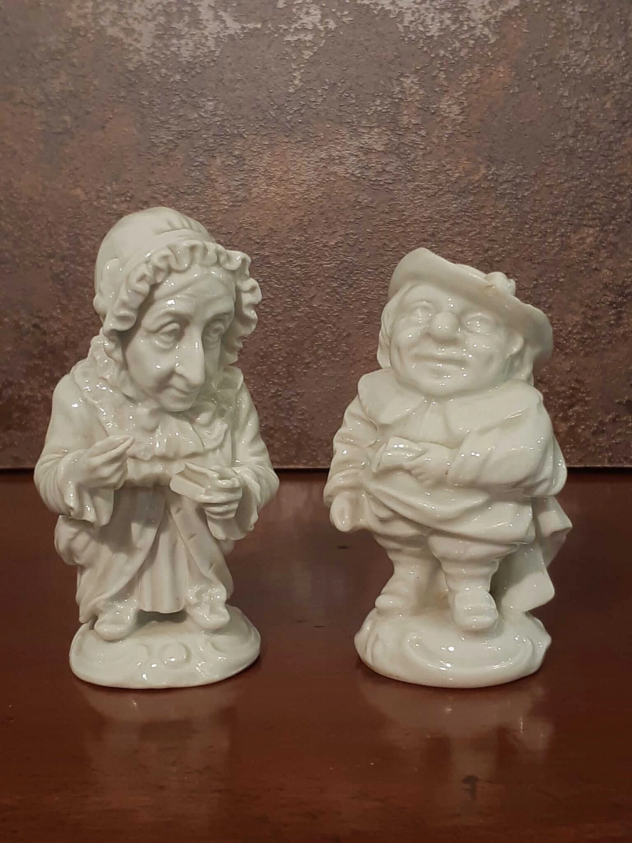 Pair of Capodimonte porcelain Caramogi sculptures, early 20th century 3