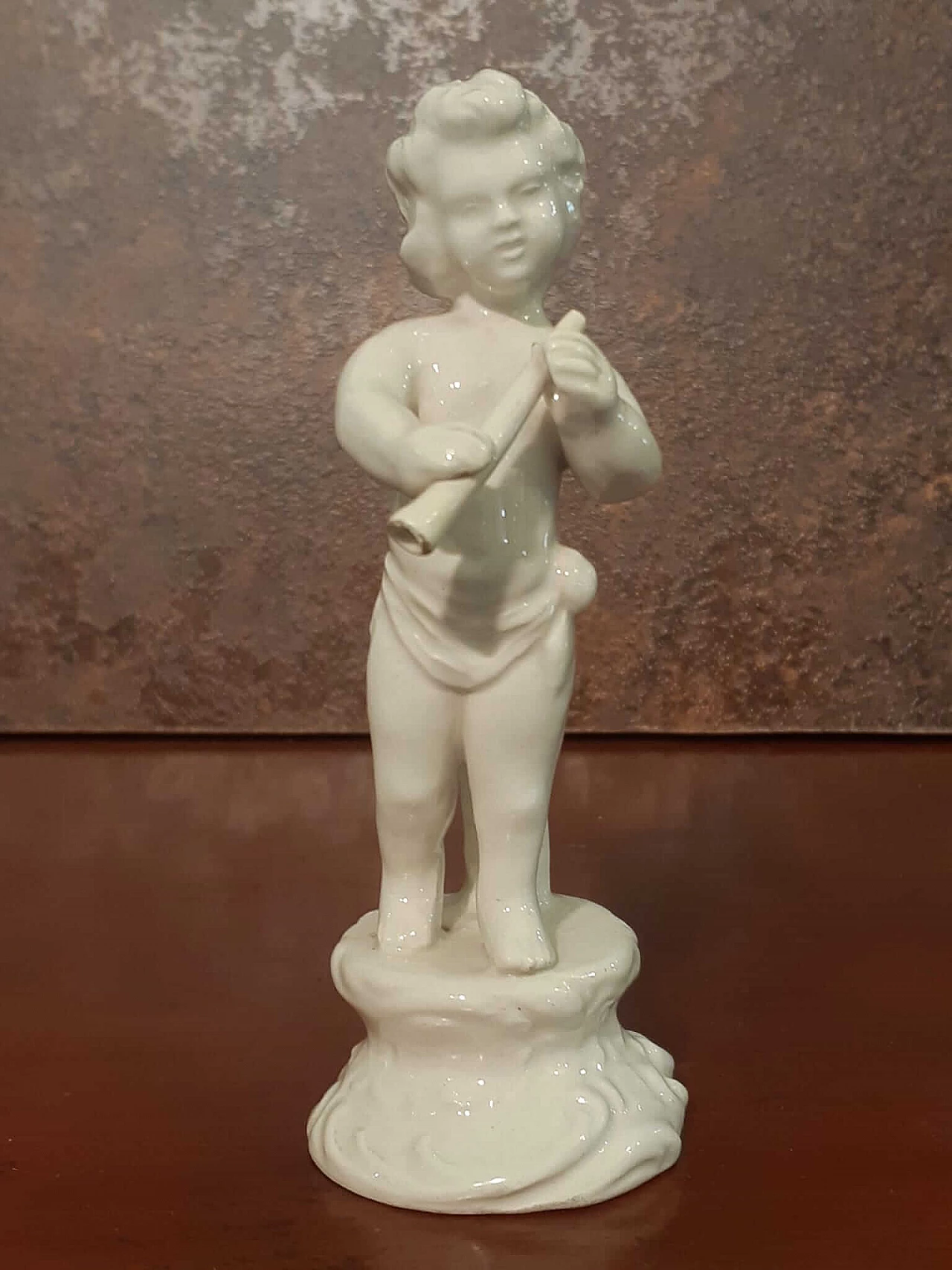 White porcelain musician putto sculpture, early 20th century 1