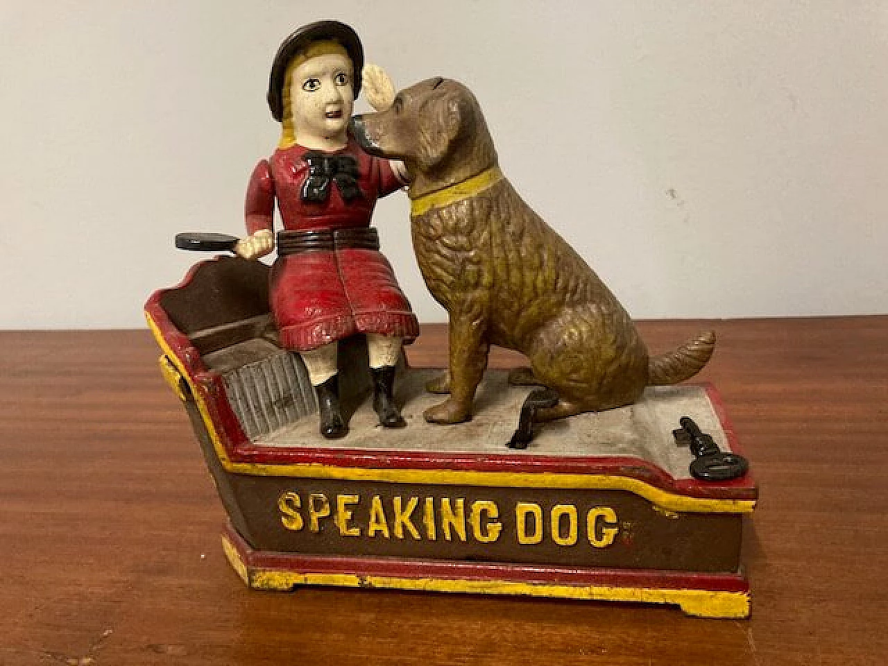 Painted cast iron piggy bank with mechanism, early 20th century 1