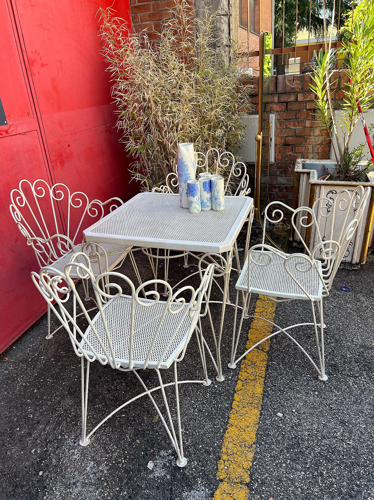 4 Chairs and garden table in white painted iron, 1960s 4