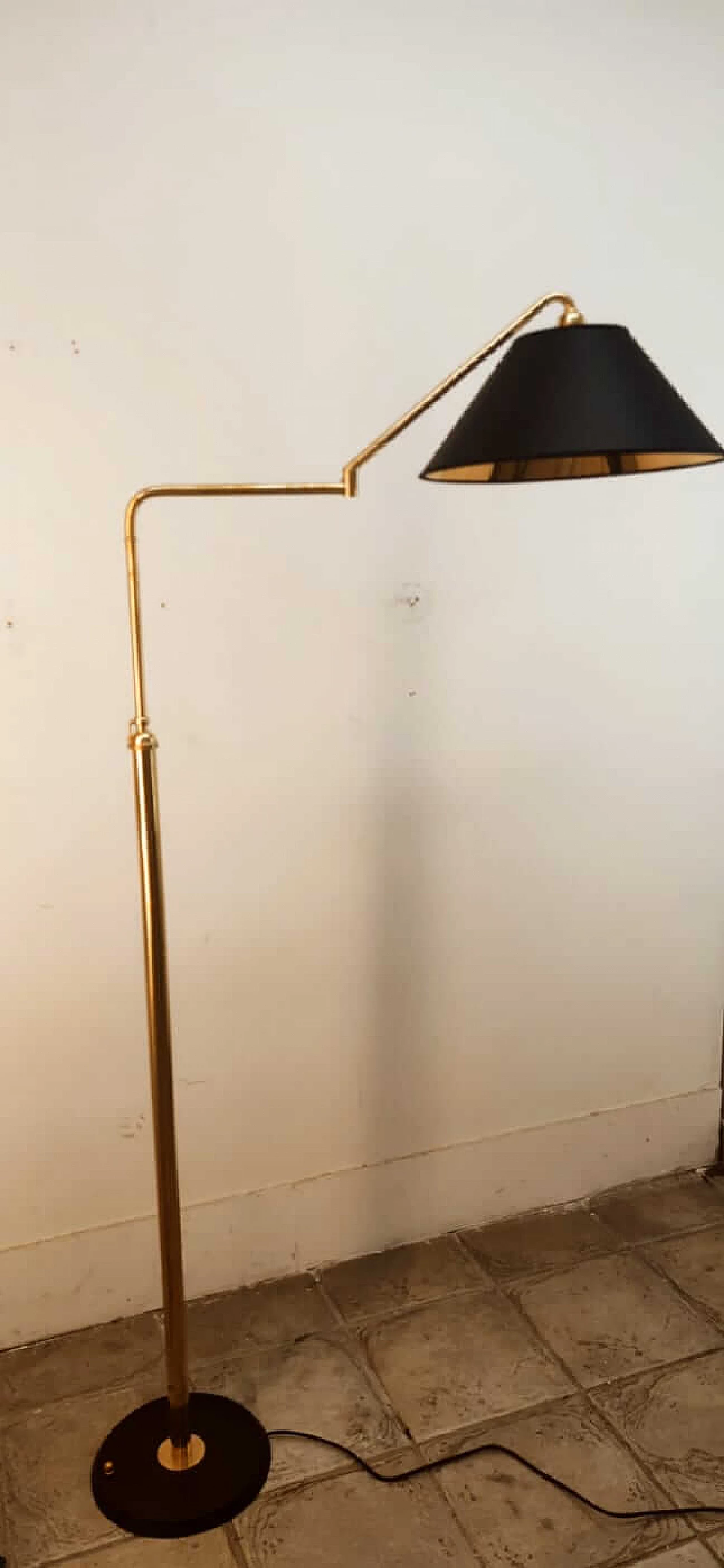 Adjustable brass floor lamp with black and gold shade, 1970s 12