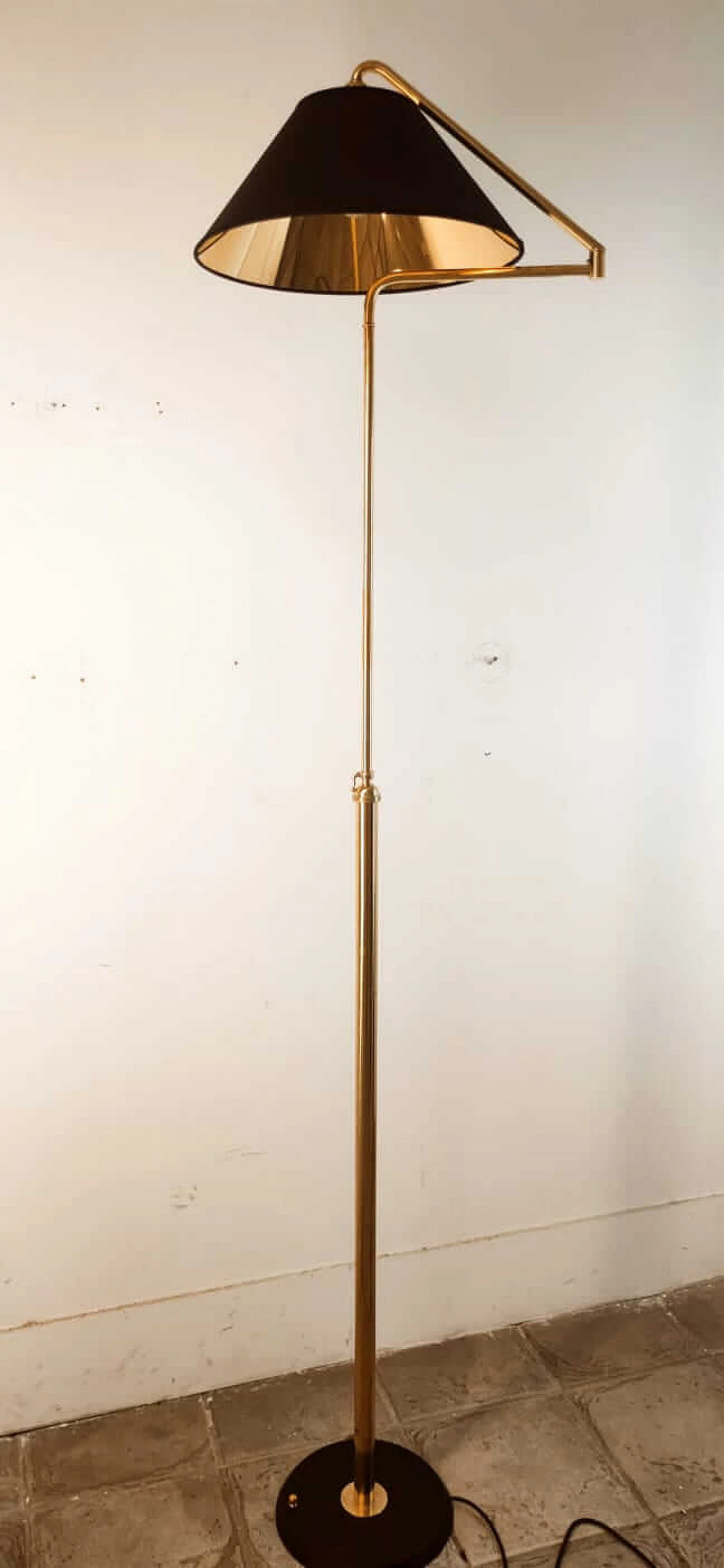 Adjustable brass floor lamp with black and gold shade, 1970s 29