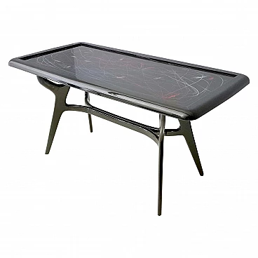 Ebonized wood table with lacquered glass top