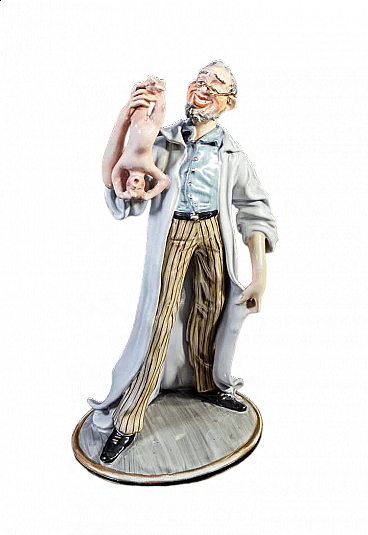 Scultura in ceramica di medico con neonato di Batignani, anni '60