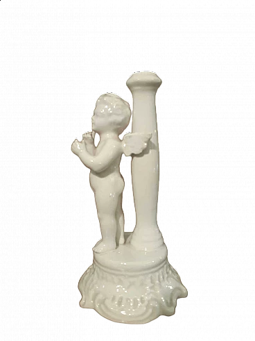 White porcelain candle holder with putto, early 20th century