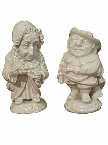 Pair of Capodimonte porcelain Caramogi sculptures, early 20th century