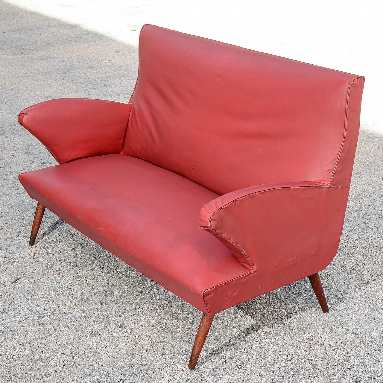 Red leatherette sofa with flared wooden feet, 1950s 4