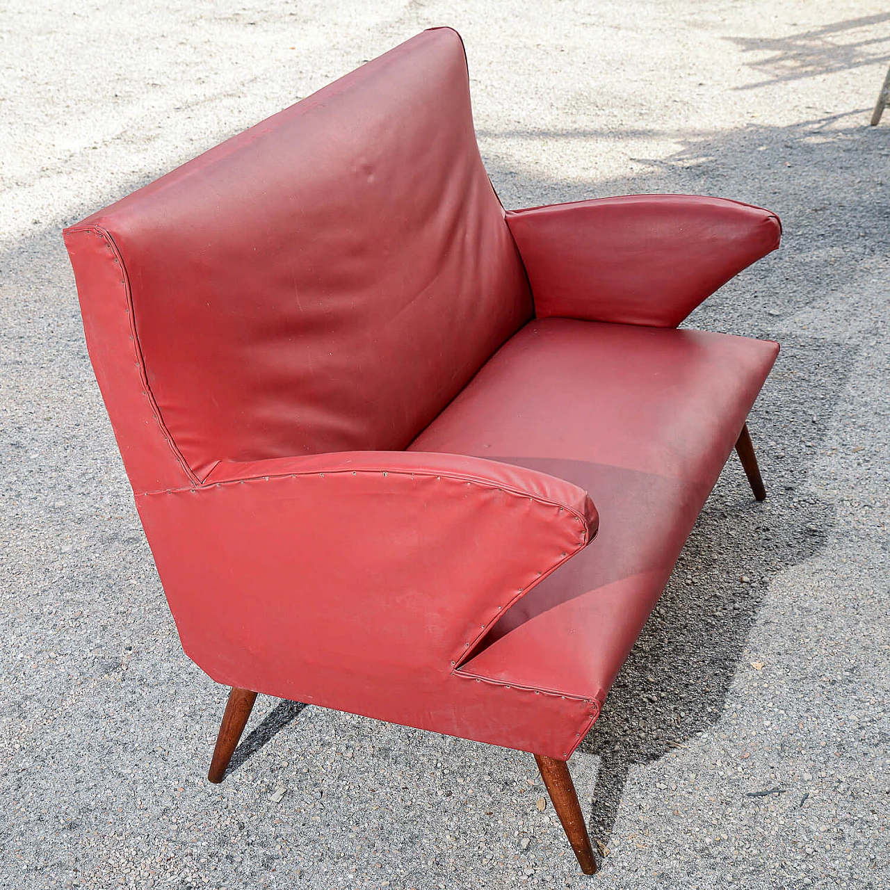 Red leatherette sofa with flared wooden feet, 1950s 6