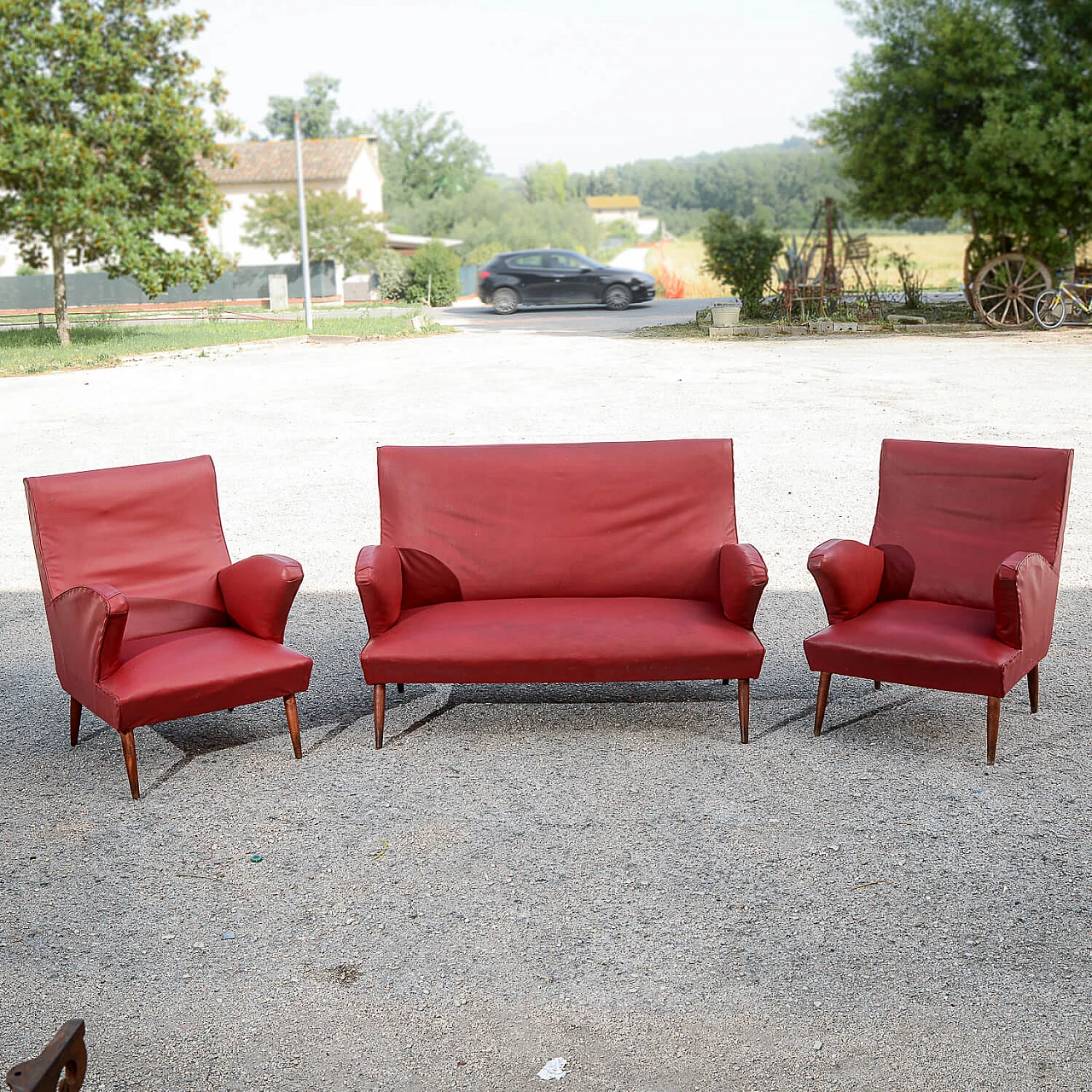 Red leatherette sofa with flared wooden feet, 1950s 8