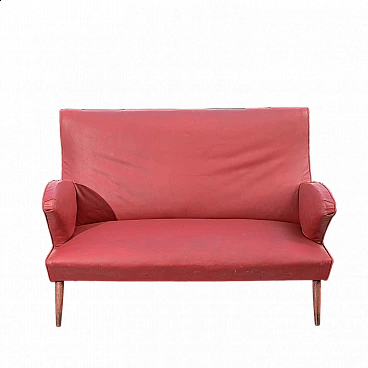Red leatherette sofa with flared wooden feet, 1950s