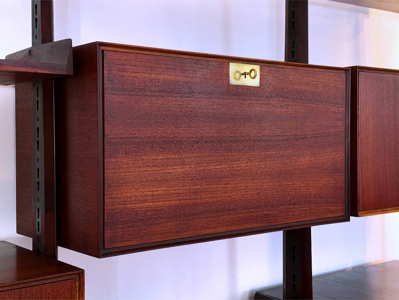 Four-module red teak bookcase with brass details by Vittorio Dassi, 1950s 10