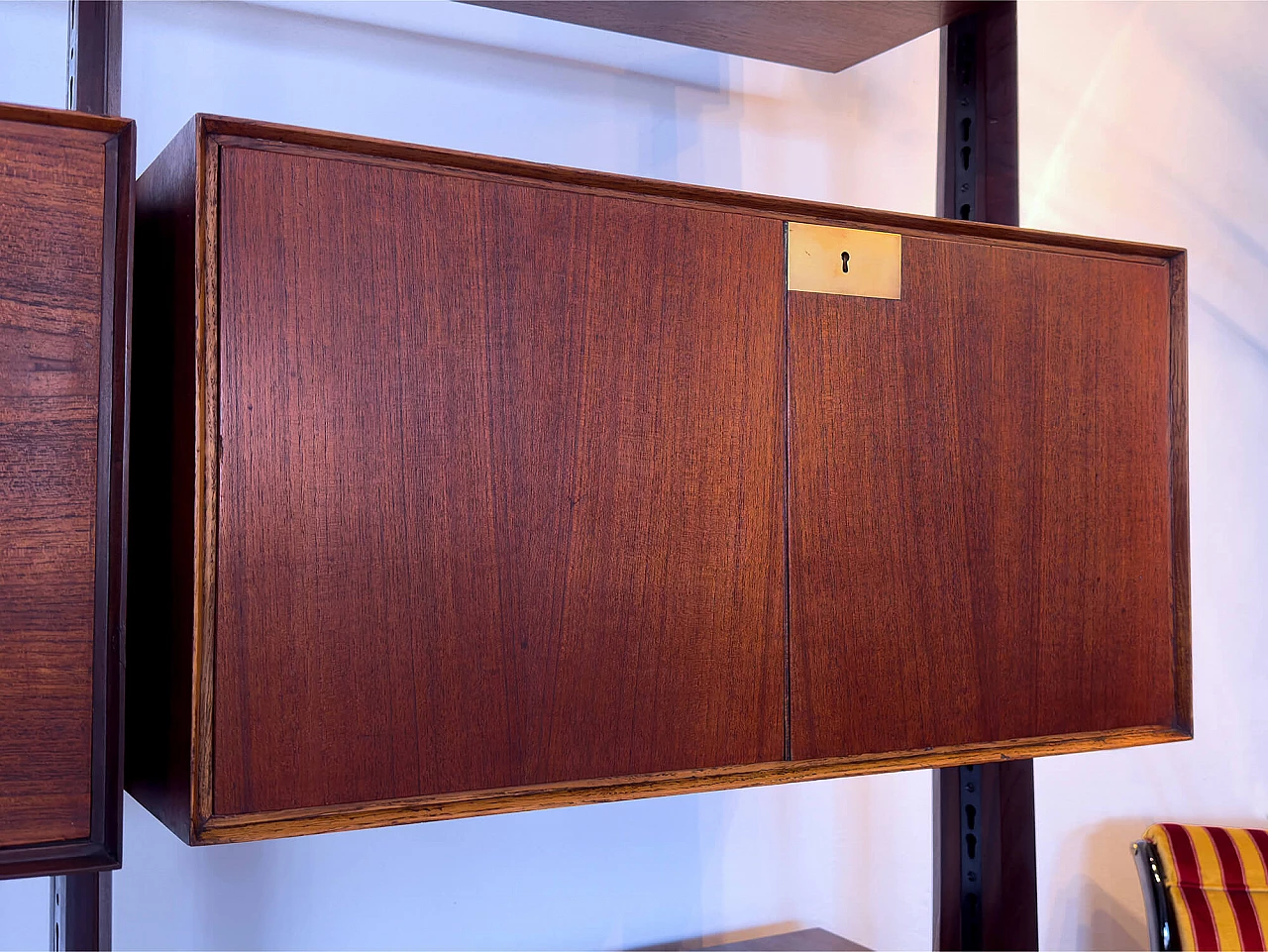 Four-module red teak bookcase with brass details by Vittorio Dassi, 1950s 19