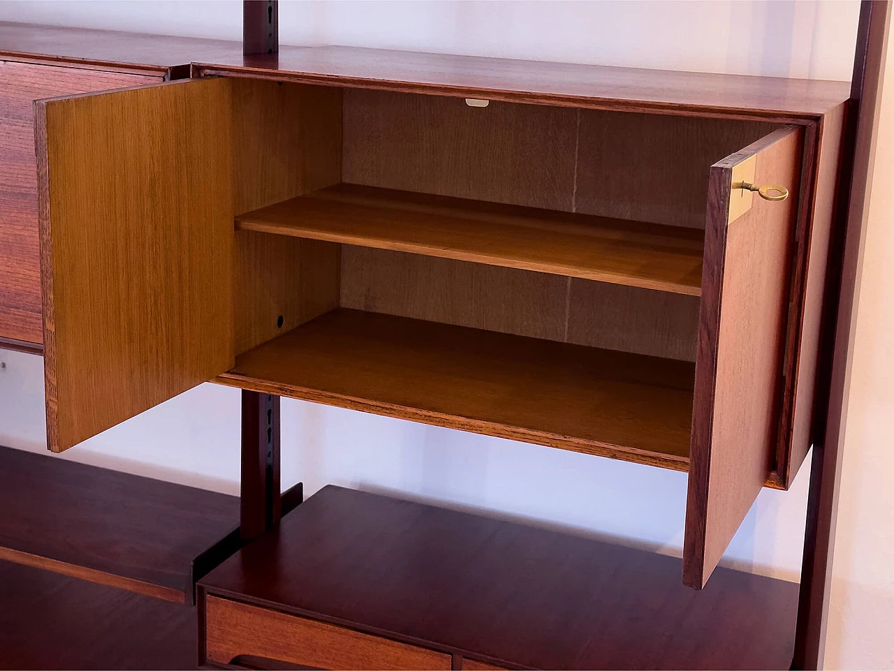Four-module red teak bookcase with brass details by Vittorio Dassi, 1950s 20