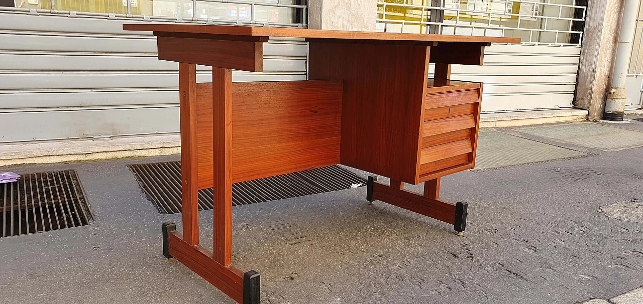 Teak centre desk with brass feet, 1960s 8