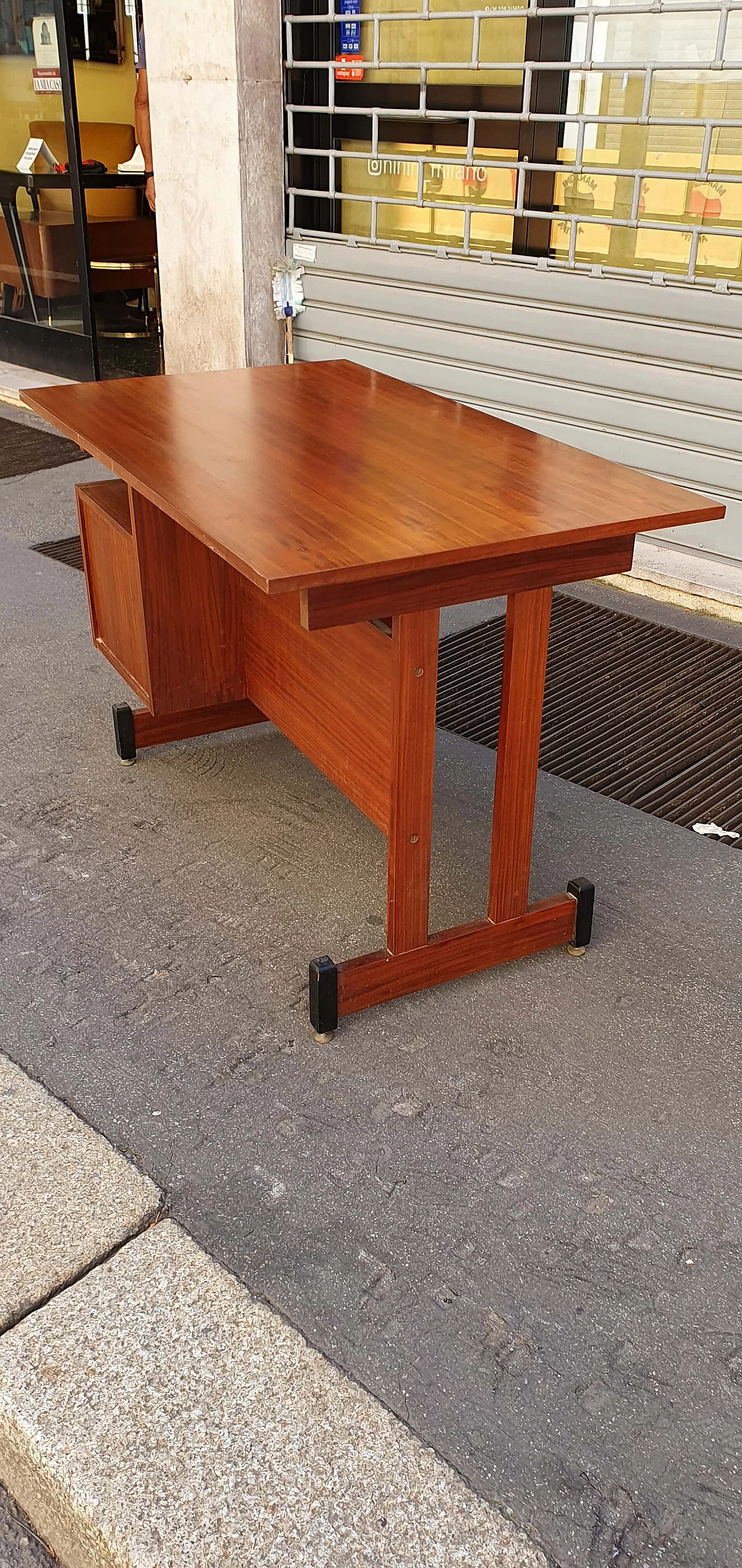 Teak centre desk with brass feet, 1960s 10